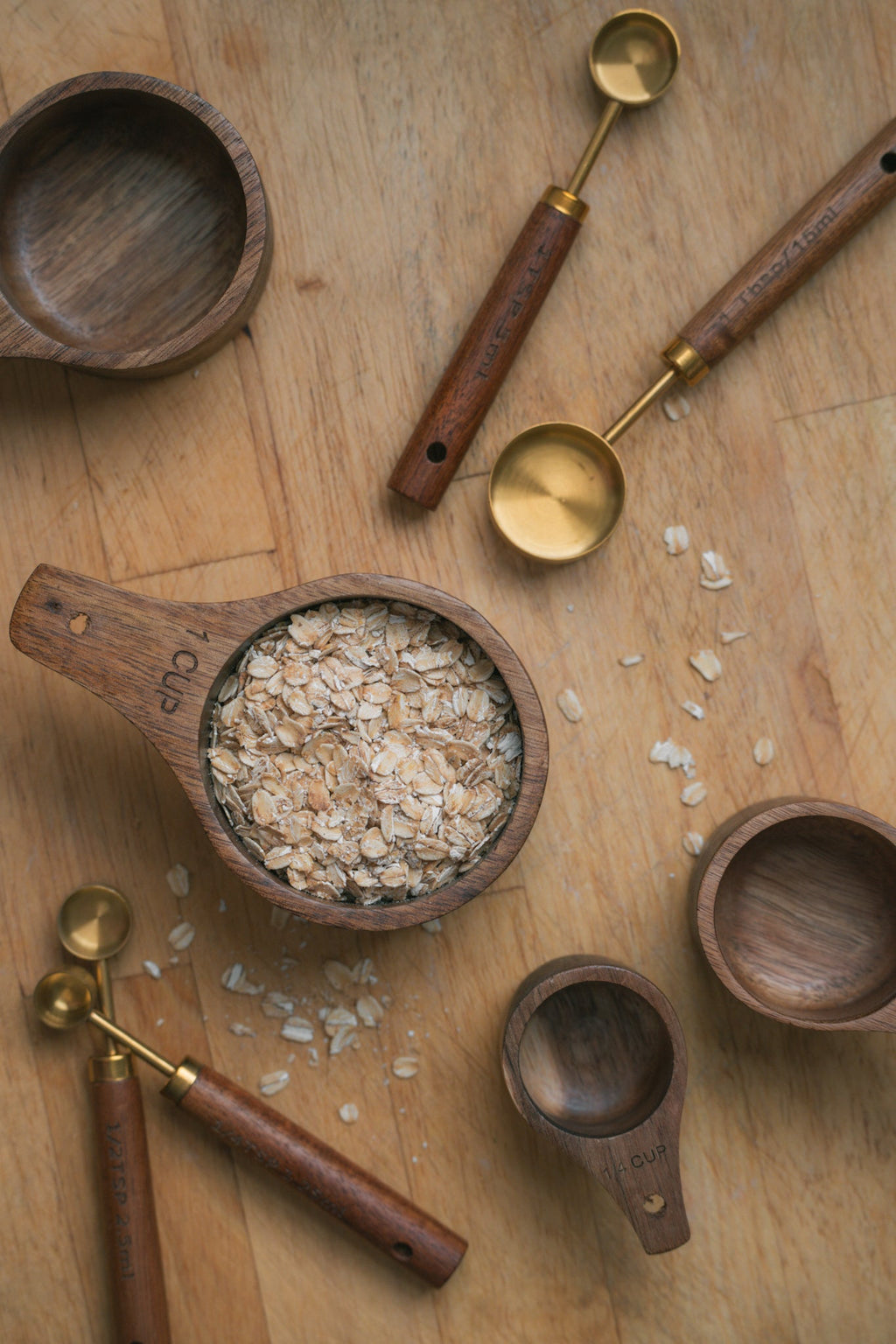 Wooden measuring cups with leather storage cord