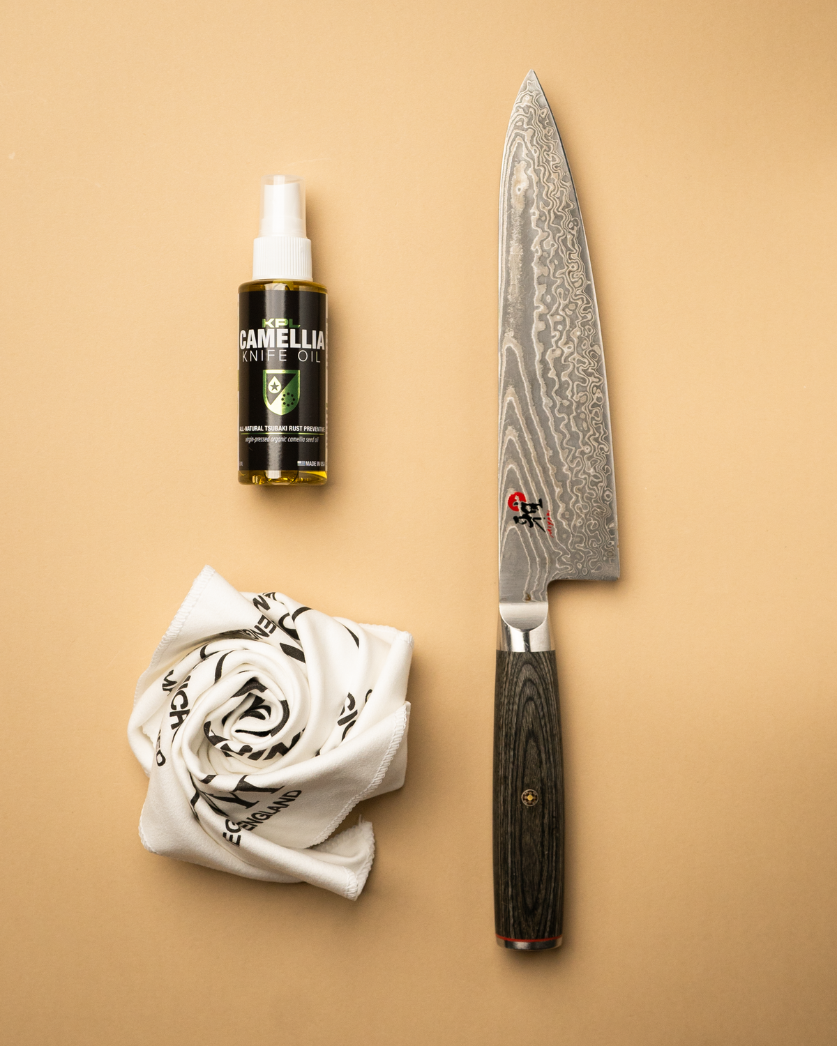 Organic camellia knife oil for protecting carbon steel tools