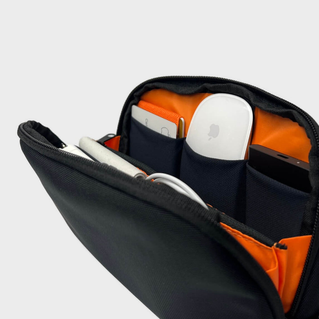 CORDURA tech organizer pouch filled with cables and chargers