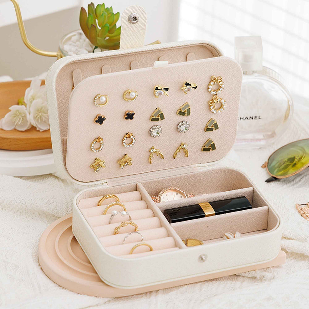 Compact travel jewelry case for earrings rings and necklaces